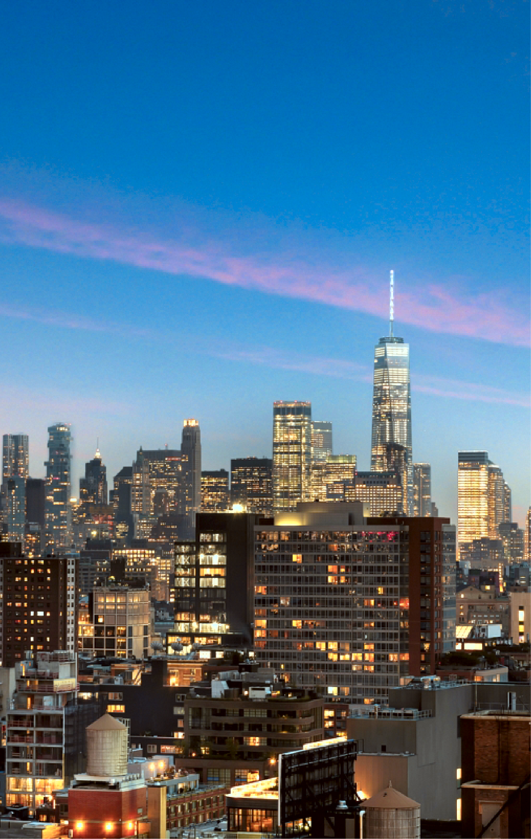 An aerial view of a city skyline at night