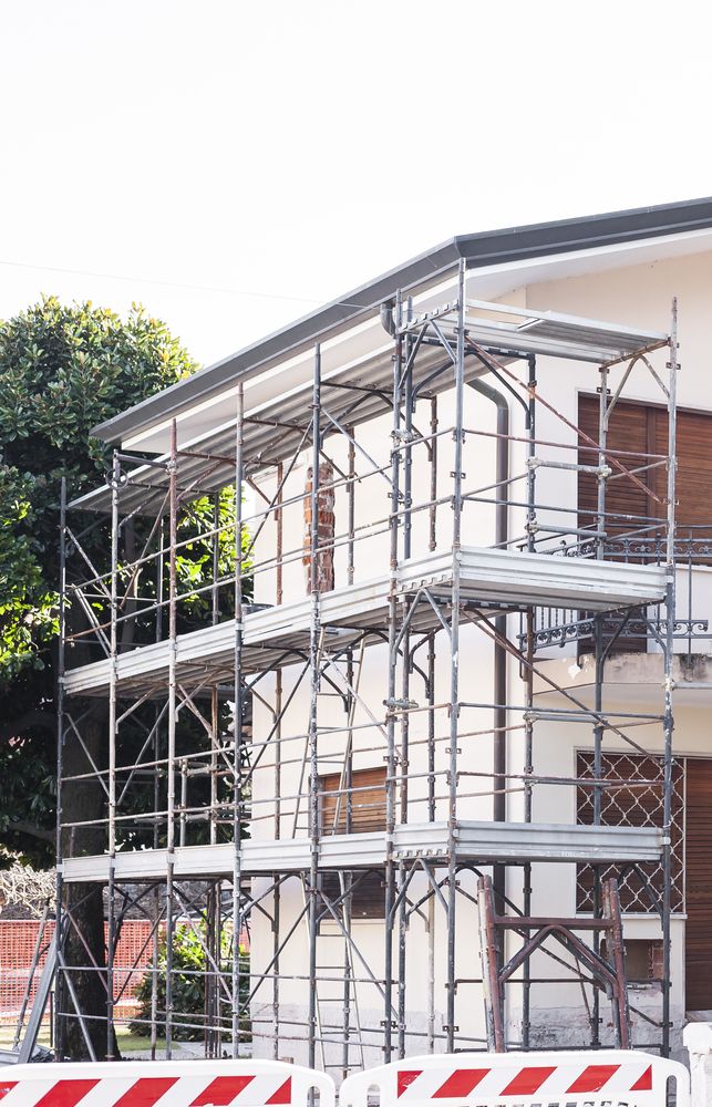 A House is Being Remodeled With Scaffolding Around It — Byron Bay Scaffold in Glen Innes, NSW