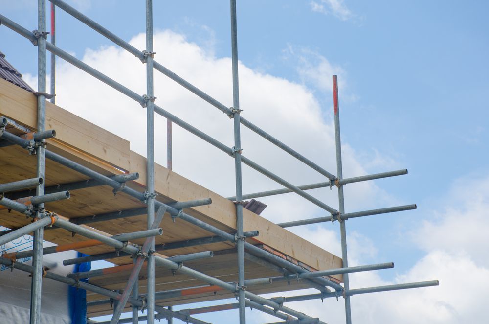 A Scaffolding Structure is Being Built on Top of a Building — Byron Bay Scaffold in Kinvara, NSW