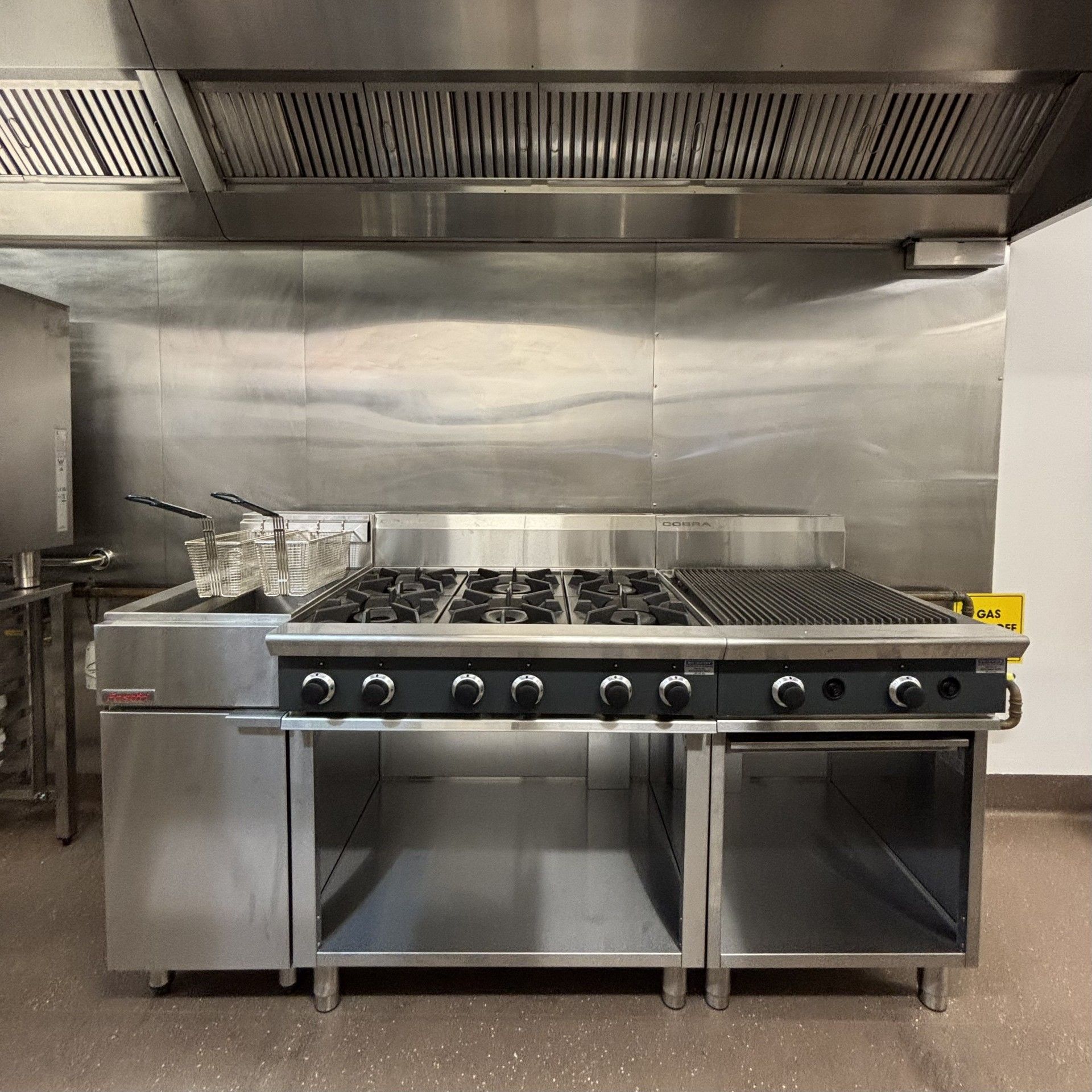 Silver Gas Stove with a fryer on the left — Mates Plumbing and Gas in Lammermoor, QLD