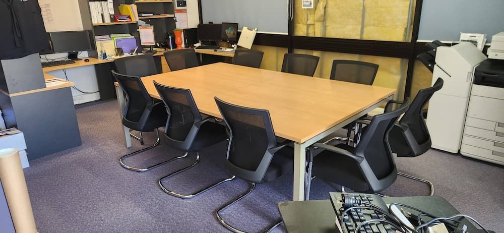 A Conference Room With a Large Table, Chairs, and Computers — Clancy's Office And  Emporium in Taree, NSW