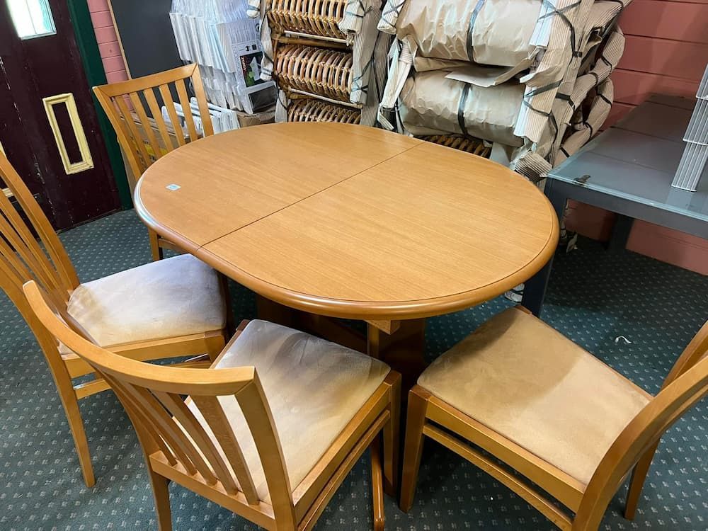 A Light Wood Dining Table With Four Matching Chairs — Clancy's Office And  Emporium in Taree, NSW
