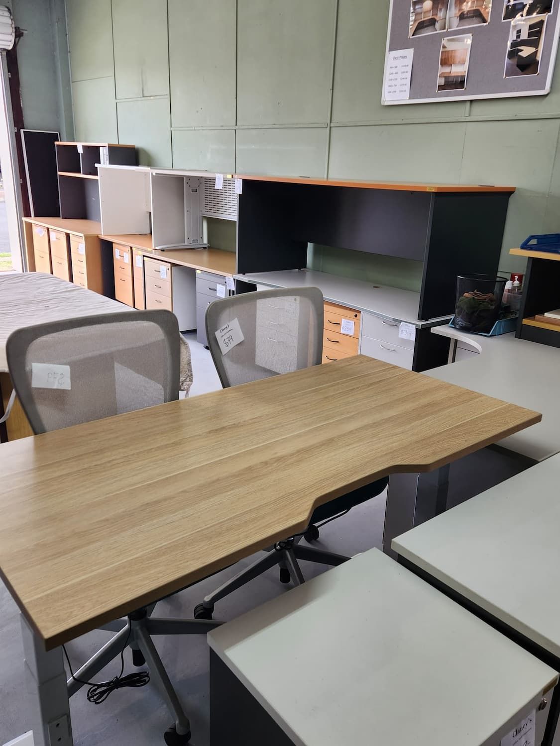 A Light-coloured Desk and Two Chairs in an Office Supply Store — Clancy's Office And  Emporium in Taree, NSW