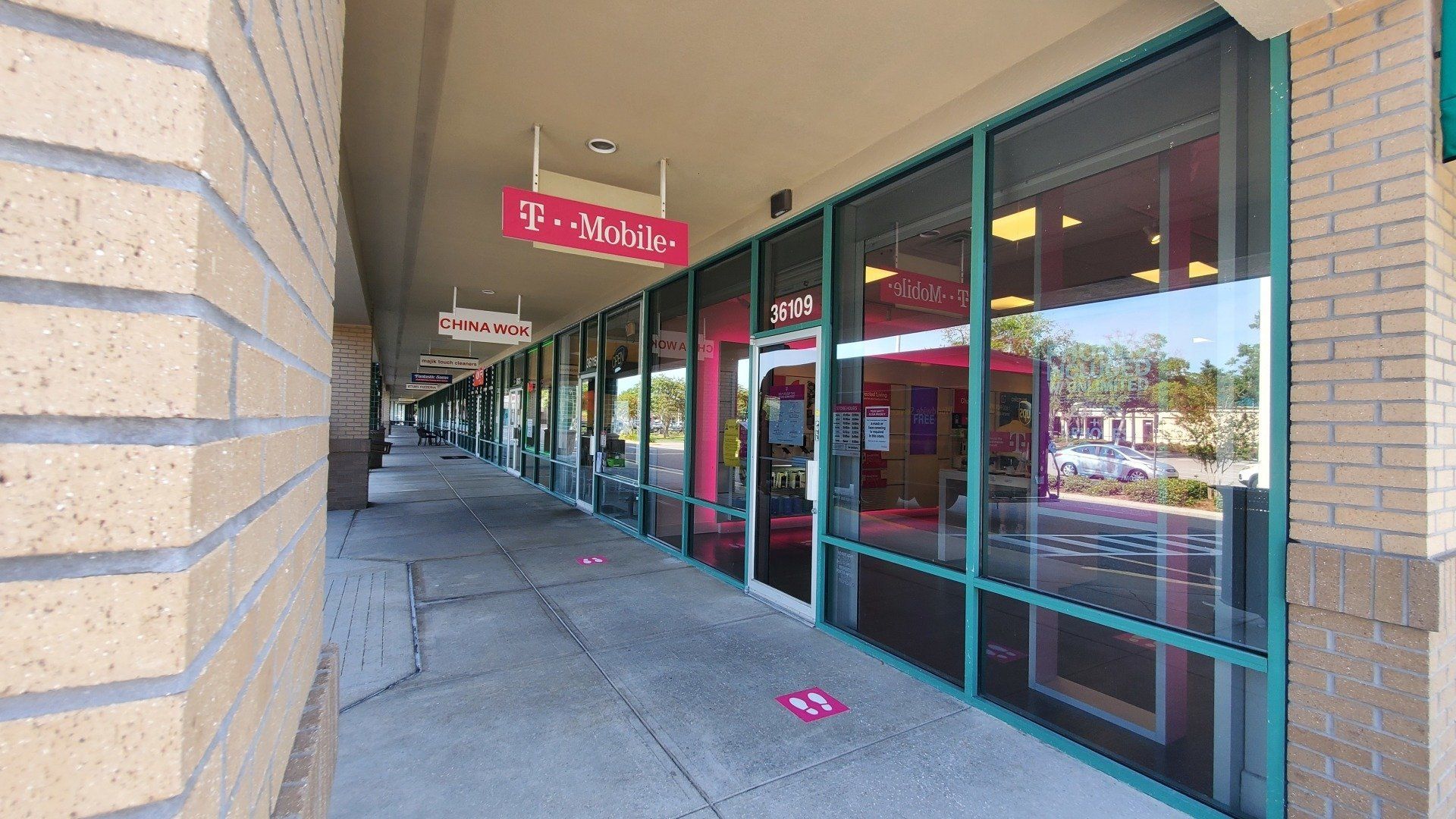 A t-mobile store is located in a shopping mall.