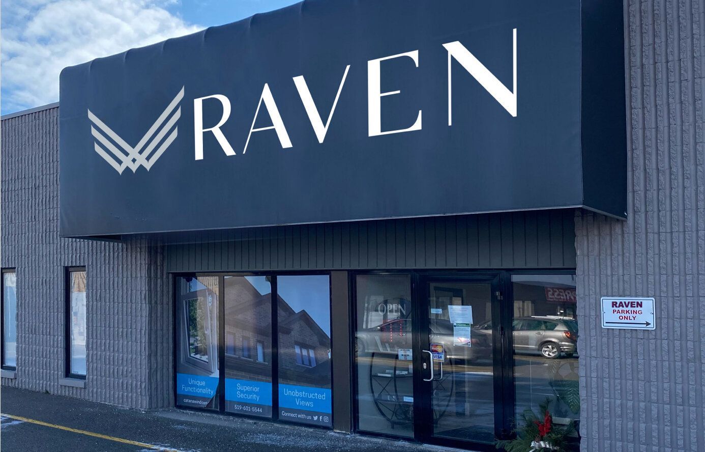 A building with a sign that says raven on it