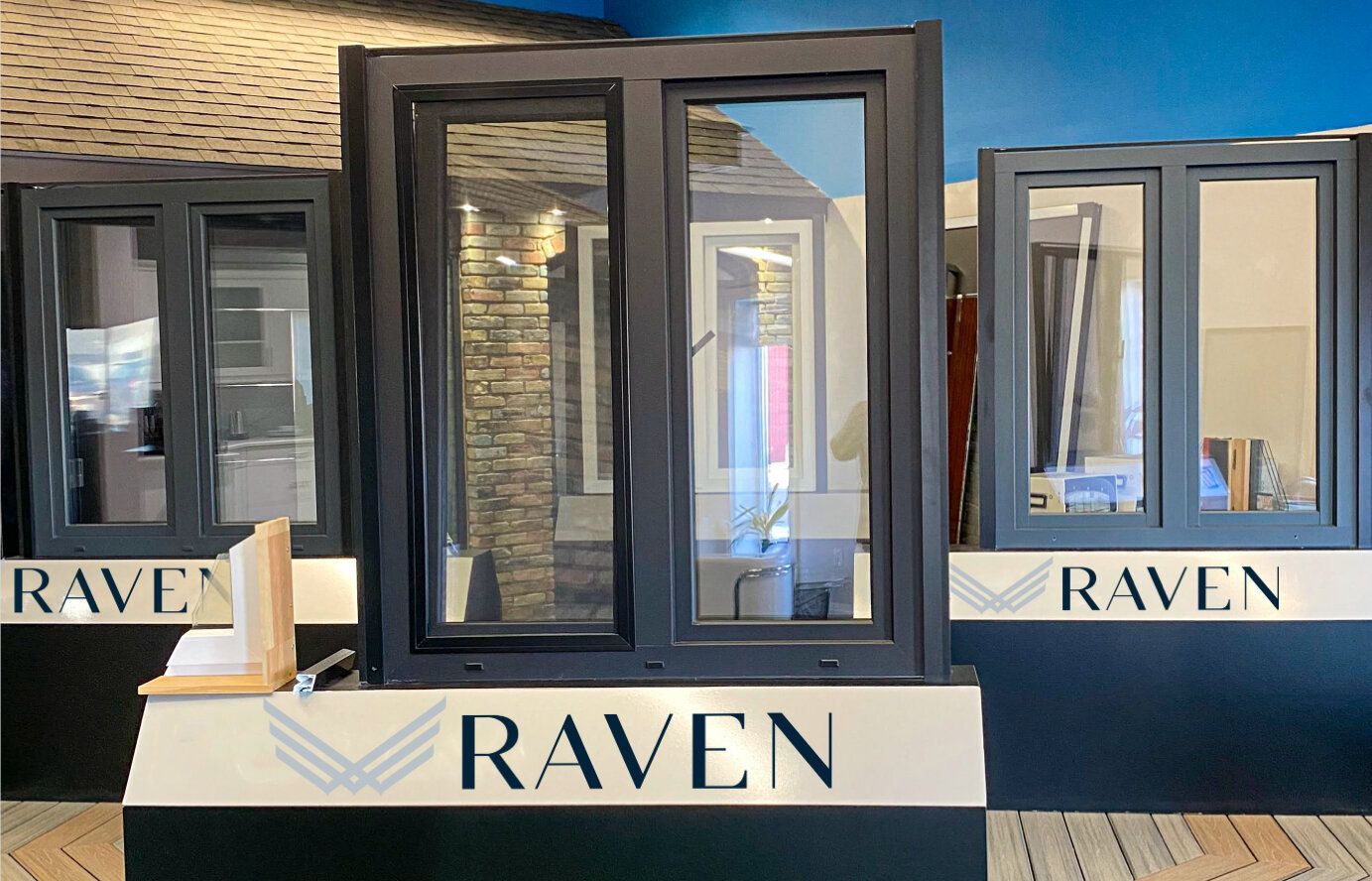 A display of raven windows and doors in a store.