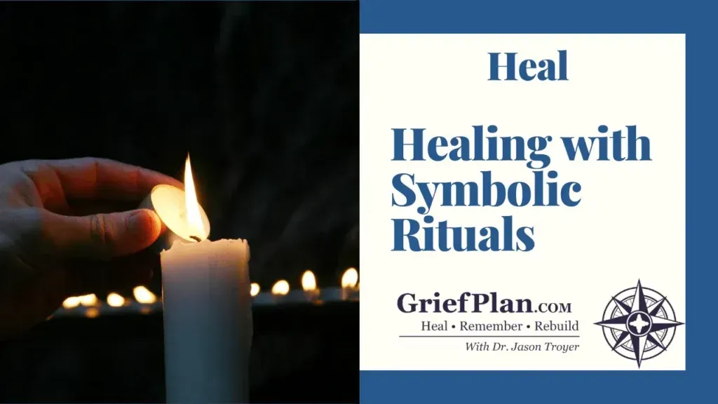 Candle lit beside text reading “Heal: Healing with Symbolic Rituals” and GriefPlan logo on dark background
