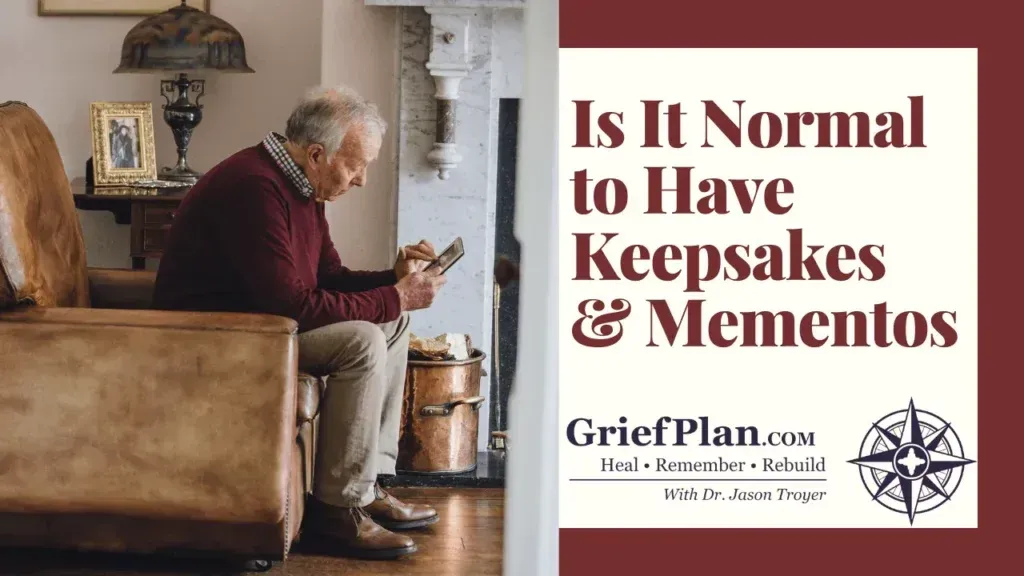 Elderly man seated in a cozy room, holding a keepsake; text reads, “Is It Normal to Have Keepsakes & Mementos”