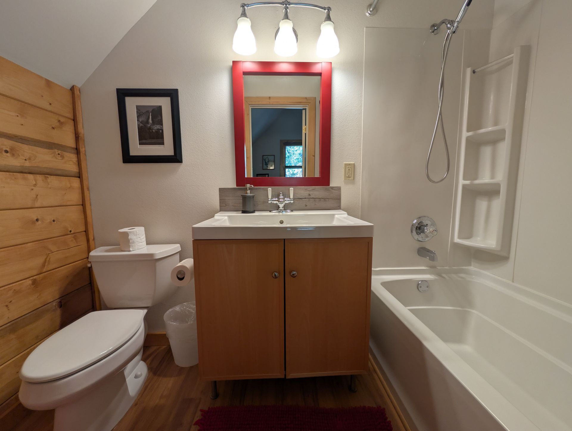 A bathroom with a jacuzzi tub and a brick wall