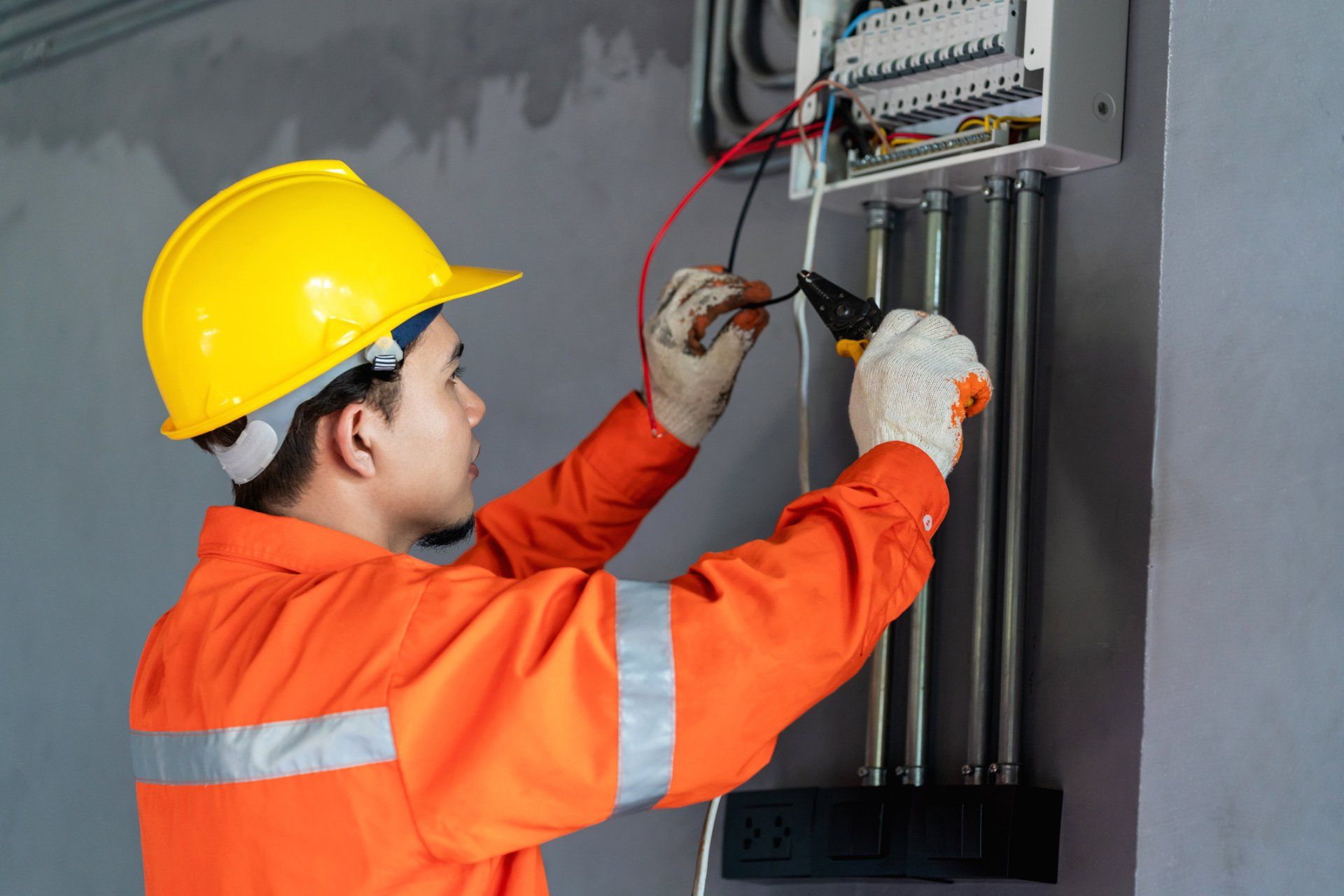 Man Repairing Wire - Savannah, GA - T.M.T Service Repairs Man Repairing Wire - Savannah, GA - T.M.T Service Repairs