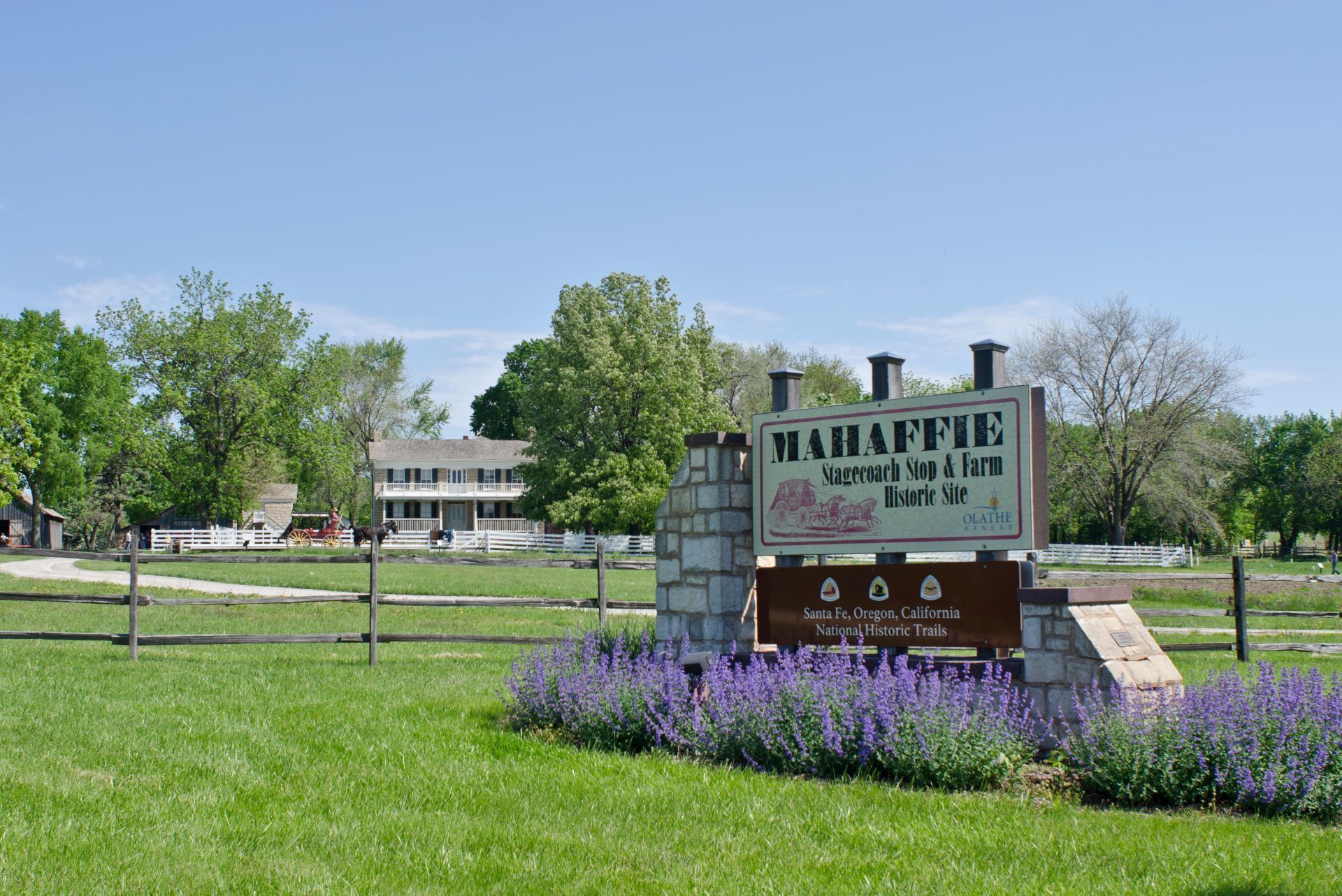A sign in a grassy field that says mahaffey