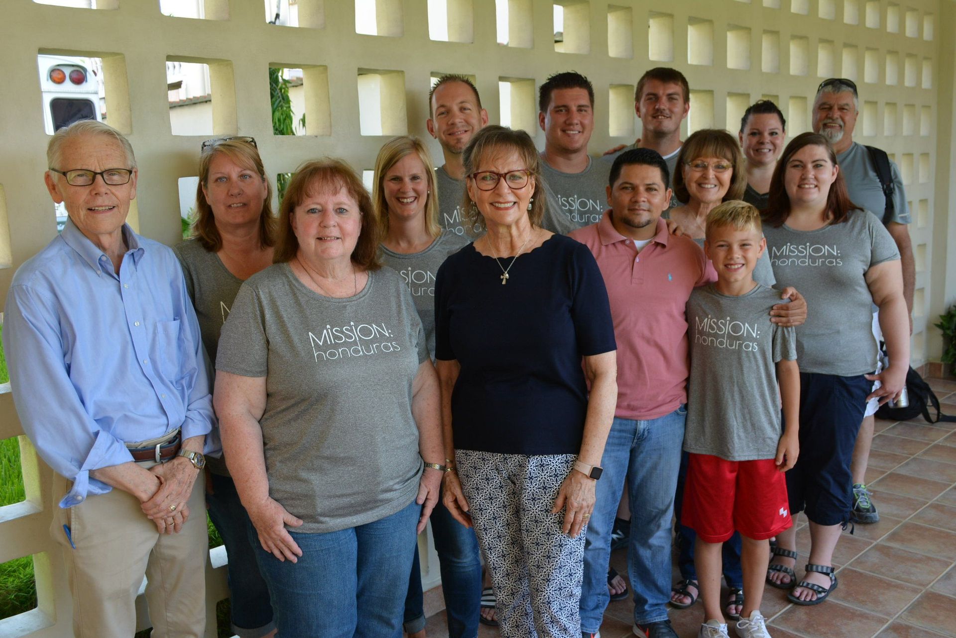 A group of people are posing for a picture together.