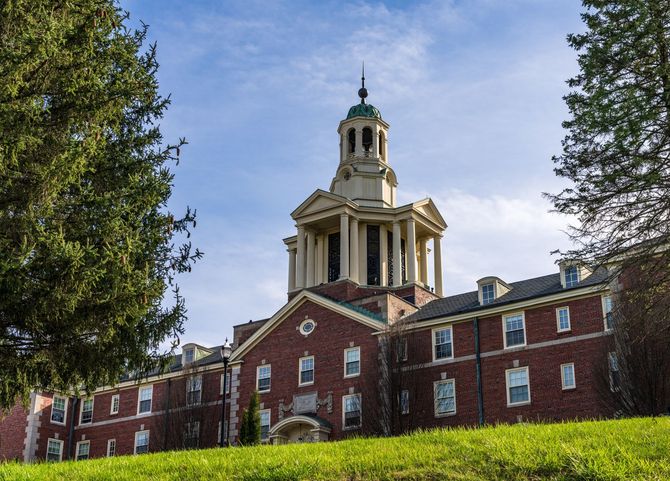 A large brick building with a clock tower on top of it