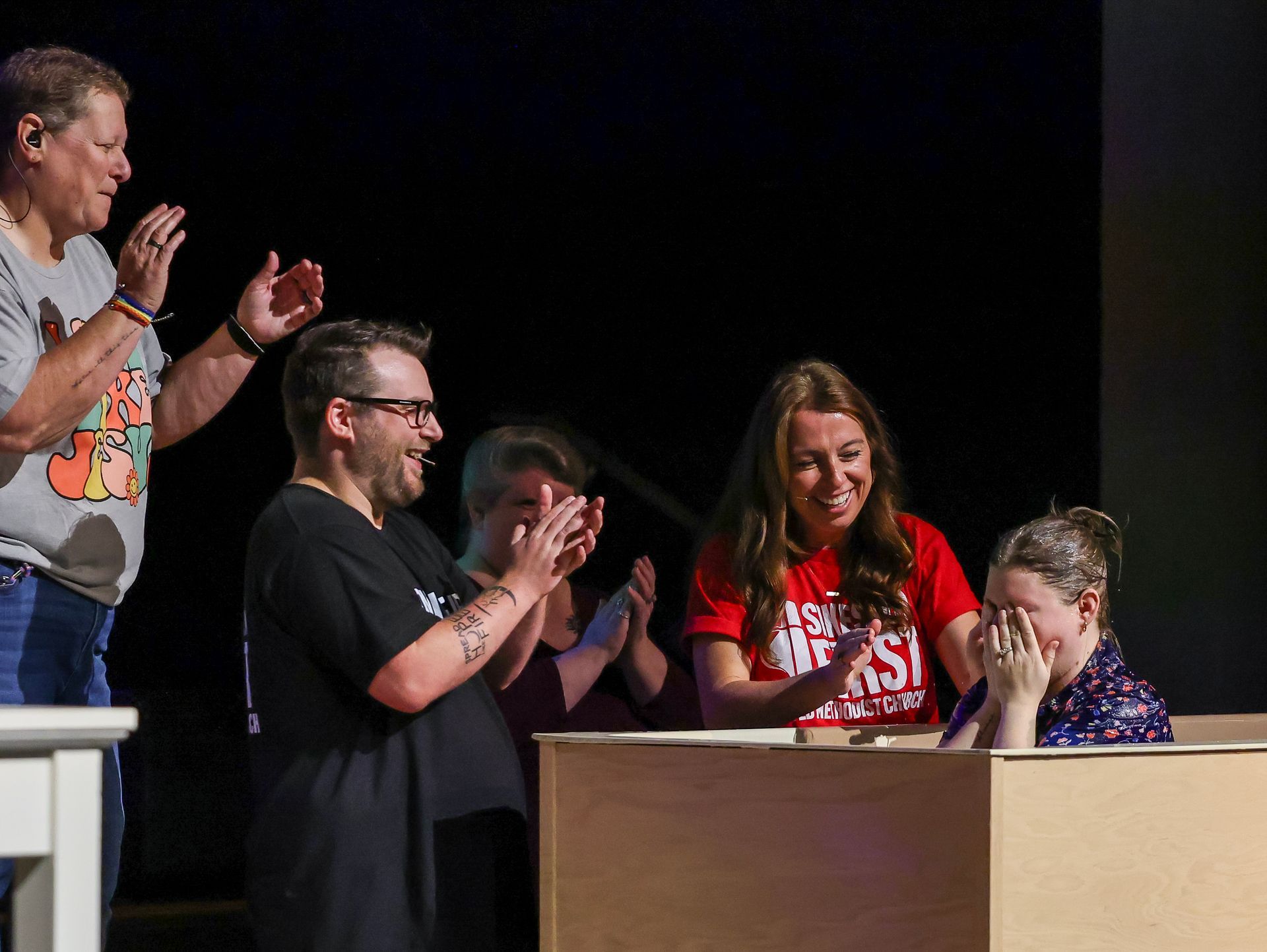Woman getting baptized