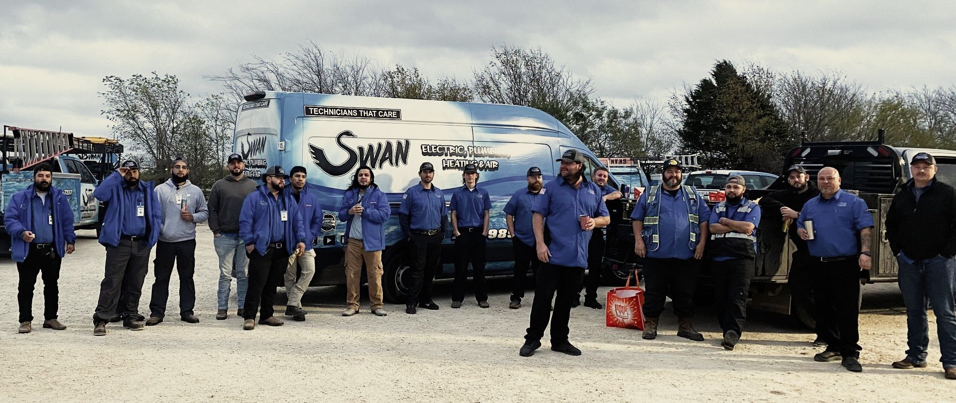 Swan electric plumbing heating and air team standing outside of their shop in sunnyvale tx