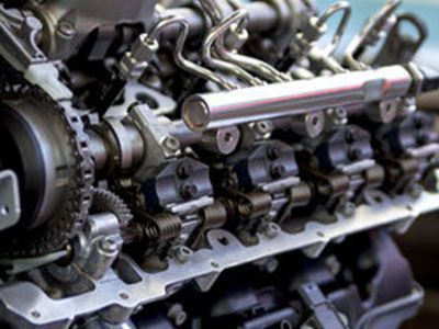 A close up of the inside of a car engine - Curry Truck & Auto