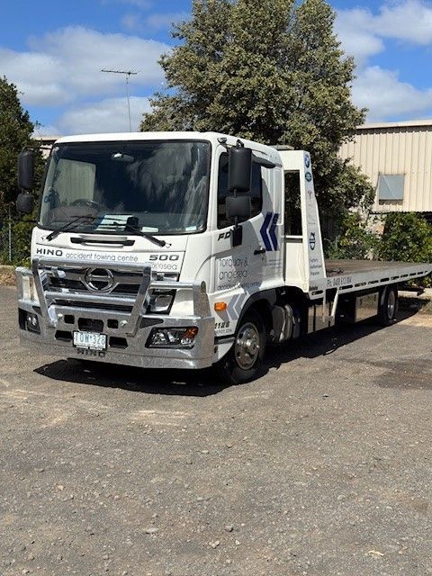 A Tow Truck With A Container On The Back Is Parked — Torquay & Anglesea Accident Towing Centre In Torquay, VIC