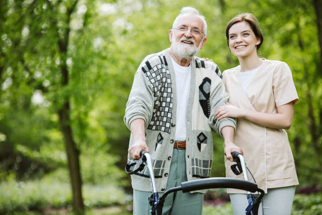 parkinson's-disease-patient-walking-outdoors-with-daughter