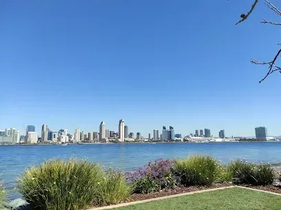 HWH San Diego Hard Money Lender - Real Estate highlights community living and investment appeal near Bayview Park in San Diego. The image showcases open green spaces, playgrounds, and scenic views of the surrounding neighborhood that reflect a family-friendly lifestyle.
