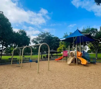 HWH San Diego Hard Money Lender - Real Estate highlights community charm and investment potential near Berry Street Park in Lemon Grove. The image showcases open green spaces, playgrounds, and walking paths that reflect the family-friendly and recreational lifestyle of the area.