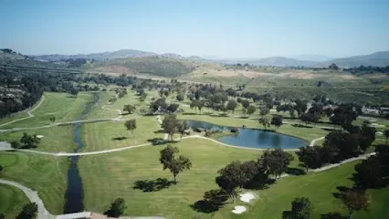 HWH San Diego Hard Money Lender - Real Estate highlights recreational living and property appeal near Bonita Golf Course. The image showcases well-maintained fairways, greens, and scenic landscaping that reflect the area’s upscale and active lifestyle.