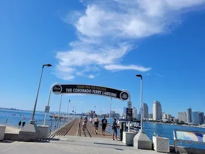 HWH San Diego Hard Money Lender - Real Estate highlights commercial and lifestyle appeal near the Coronado Ferry Center. The image showcases the ferry terminal, waterfront views, and bustling activity that reflect the area’s vibrant community and tourism draw.