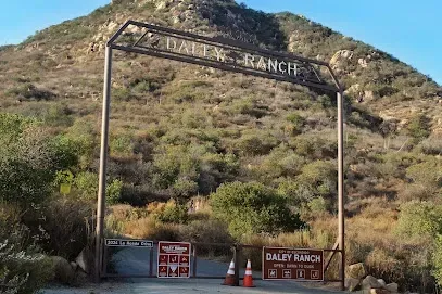 HWH San Diego Hard Money Lender - Real Estate emphasizes the natural beauty and investment potential near Daley Ranch Park in Escondido. The image features scenic hiking trails, open green spaces, and rolling hills that showcase the area’s outdoor lifestyle.
