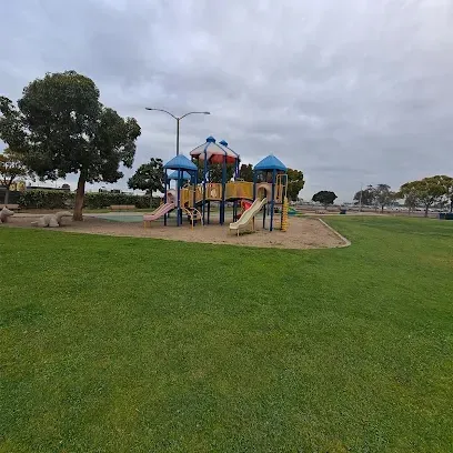 HWH San Diego Hard Money Lender - Real Estate highlights community living and investment potential near Pepper Park in Escondido. The image showcases open fields, playgrounds, and walking paths that reflect the area’s family-friendly and recreational lifestyle.
