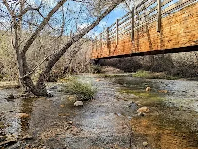 HWH San Diego Hard Money Lender - Real Estate highlights infrastructure and investment potential near the Sweetwater River Bridge in National City. The image showcases the bridge spanning the river, surrounded by urban and natural scenery, reflecting connectivity and accessibility in the area.
