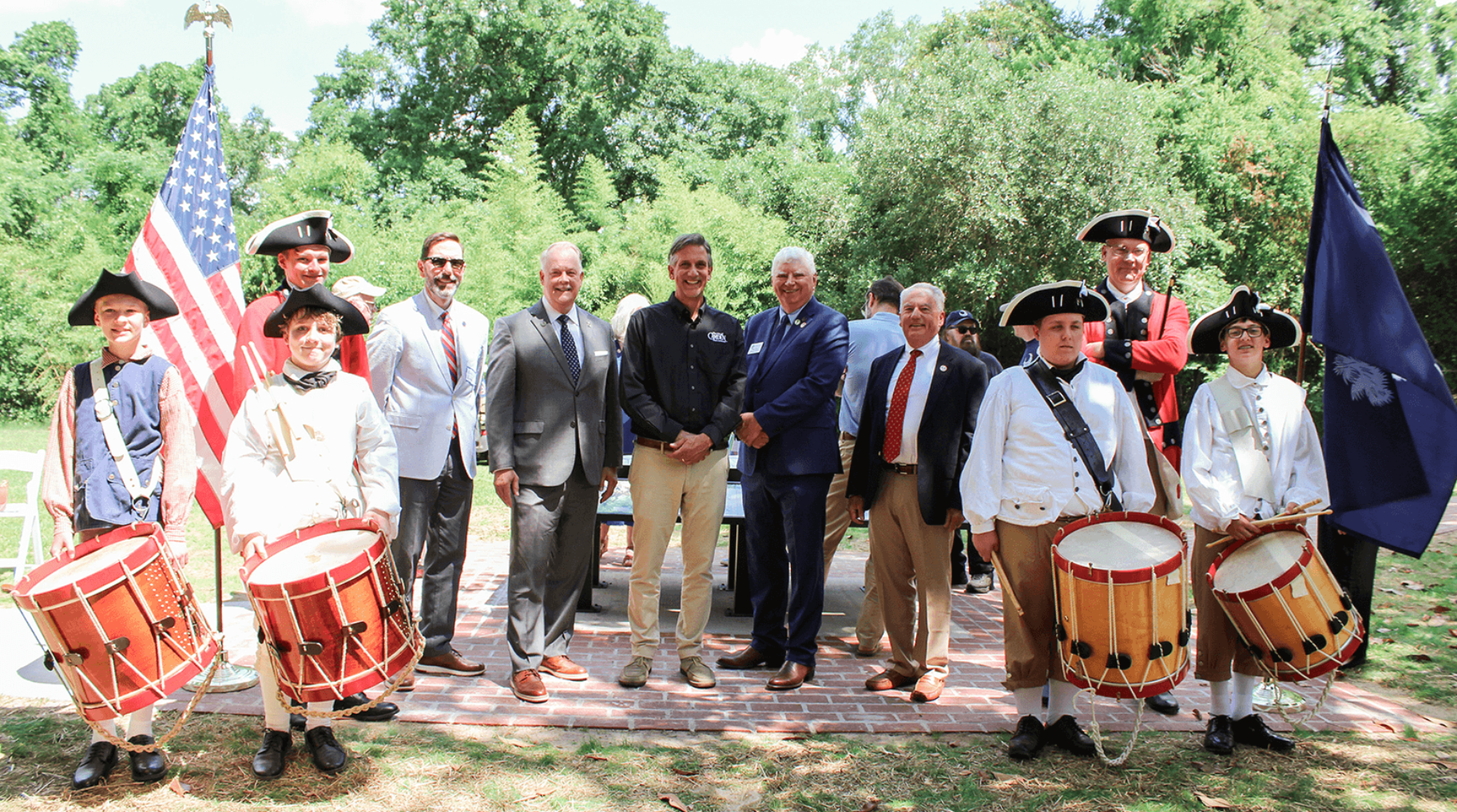 Hobkirk Hill Ribbon Cutting Photo, men and boys dressed in historical clothing