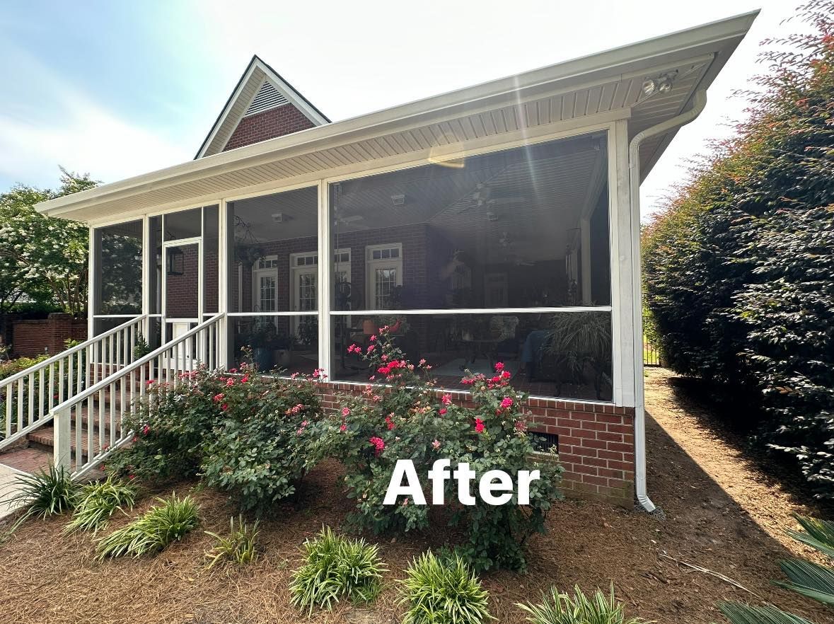 Front porch with white railings, steps, and flowering plants in a sunny yard, labeled “After”
