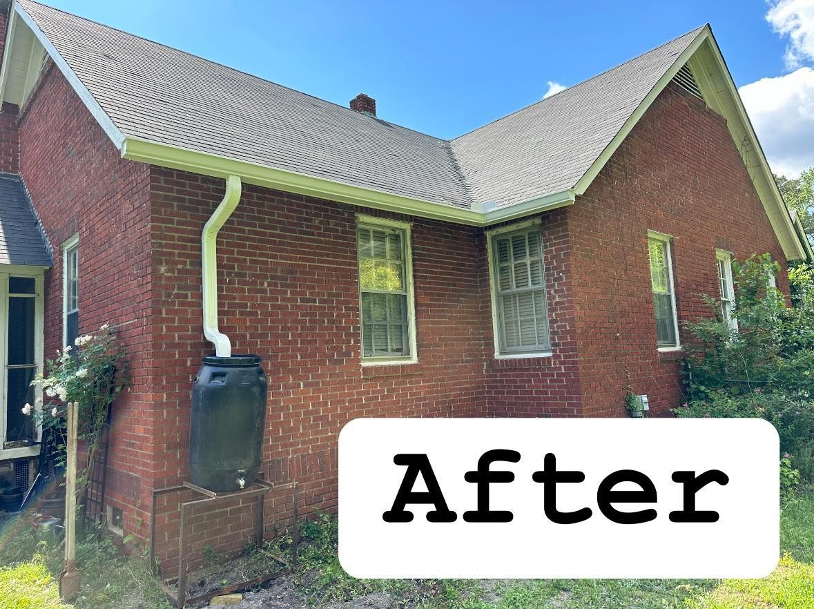 Red brick house with gray shingle roof and white trim, labeled “After”
