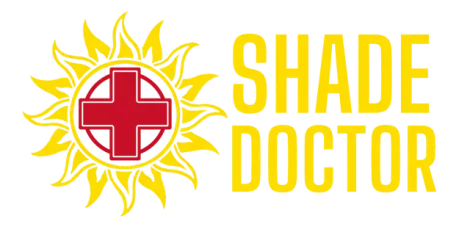 Shade Doctor logo with yellow sunburst, red medical cross, and yellow text on white background
