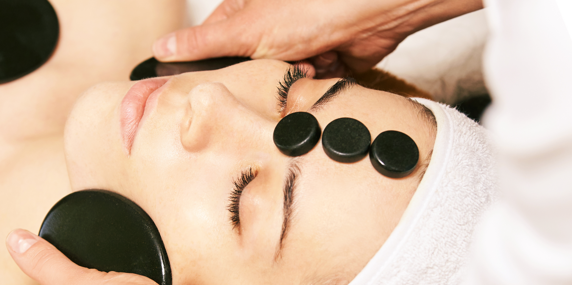 Woman With Flower On Ear — Greenwood Village, CO — Beau Visage Skin Care & Spa Woman With Flower On Ear — Greenwood Village, CO — Beau Visage Skin Care & Spa