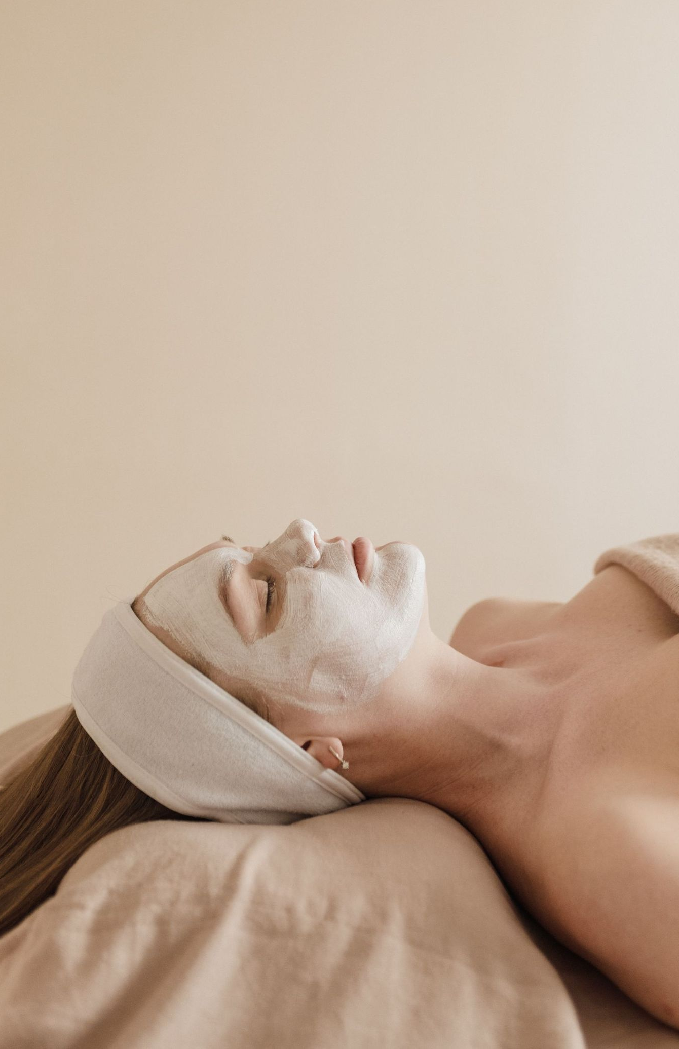 Woman With Flower On Ear — Greenwood Village, CO — Beau Visage Skin Care & Spa Woman With Flower On Ear — Greenwood Village, CO — Beau Visage Skin Care & Spa