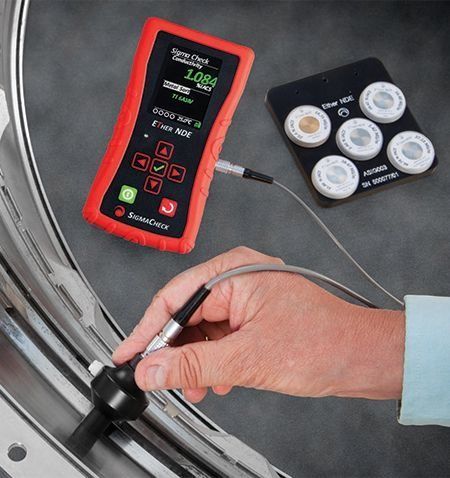 Ether NDE SigmaCheck 2 conductivity meter in use