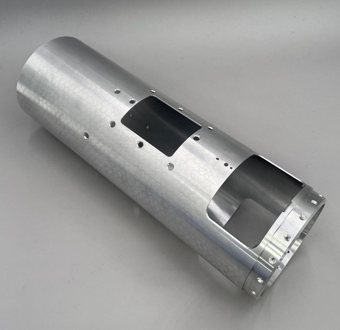 Aluminum tube with cutouts