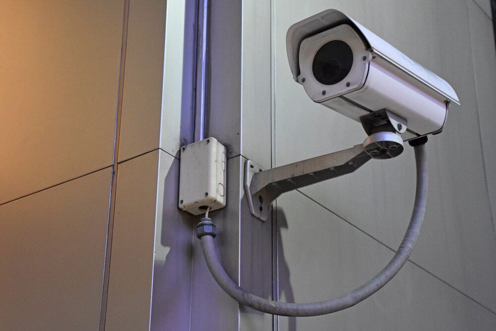Security Camera Mounted on a Building Wall, Recording — Flexicoms Communications in Ingham, QLD