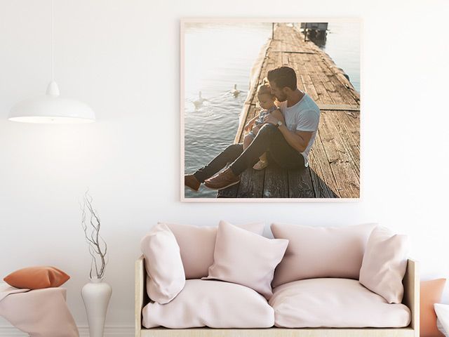 Canvas on wall over couch