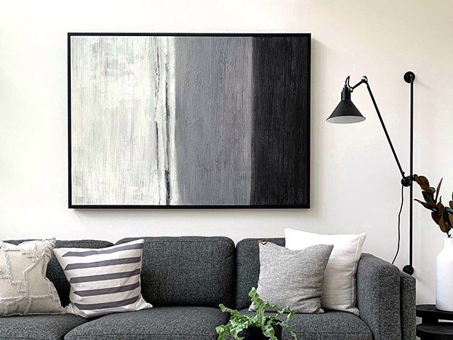 Framed canvas on living room wall