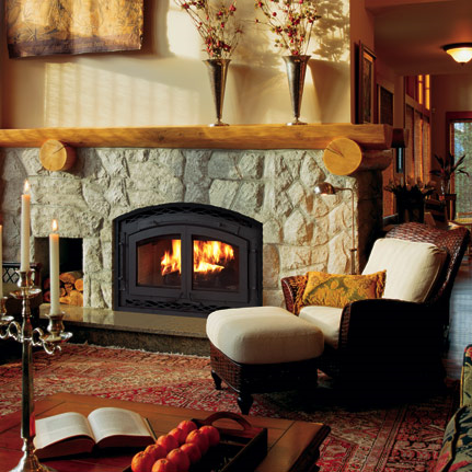A living room with a fireplace and a chair A living room with a fireplace and a chair
