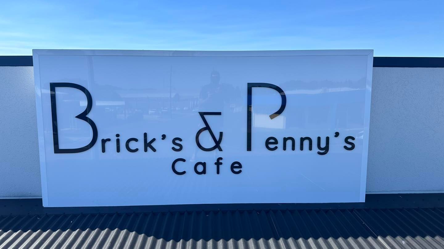 A White Sign for Brick 's & Penny 's Cafe — Global Signage In Ingham, QLD
