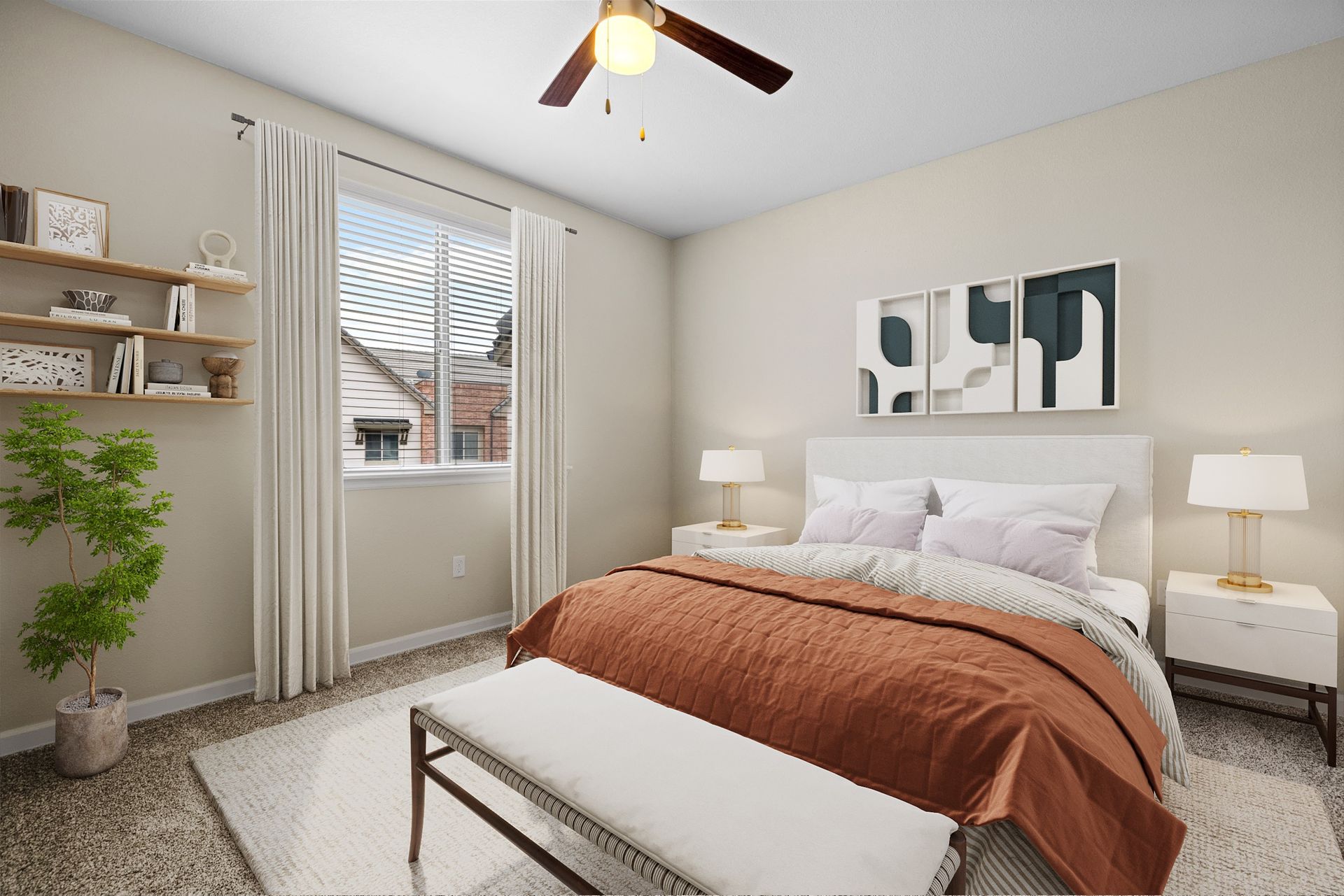 Bedroom in an apartment with a bed, nightstands, lamps, window with blinds, ceiling fan, and bench at the foota t The Parc at Greenwood Village.