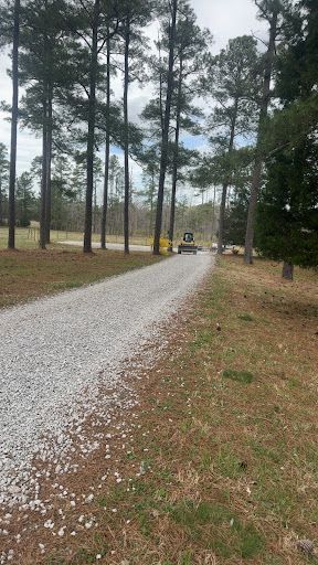 H&H Outdoor Services installing gravel for a property access area