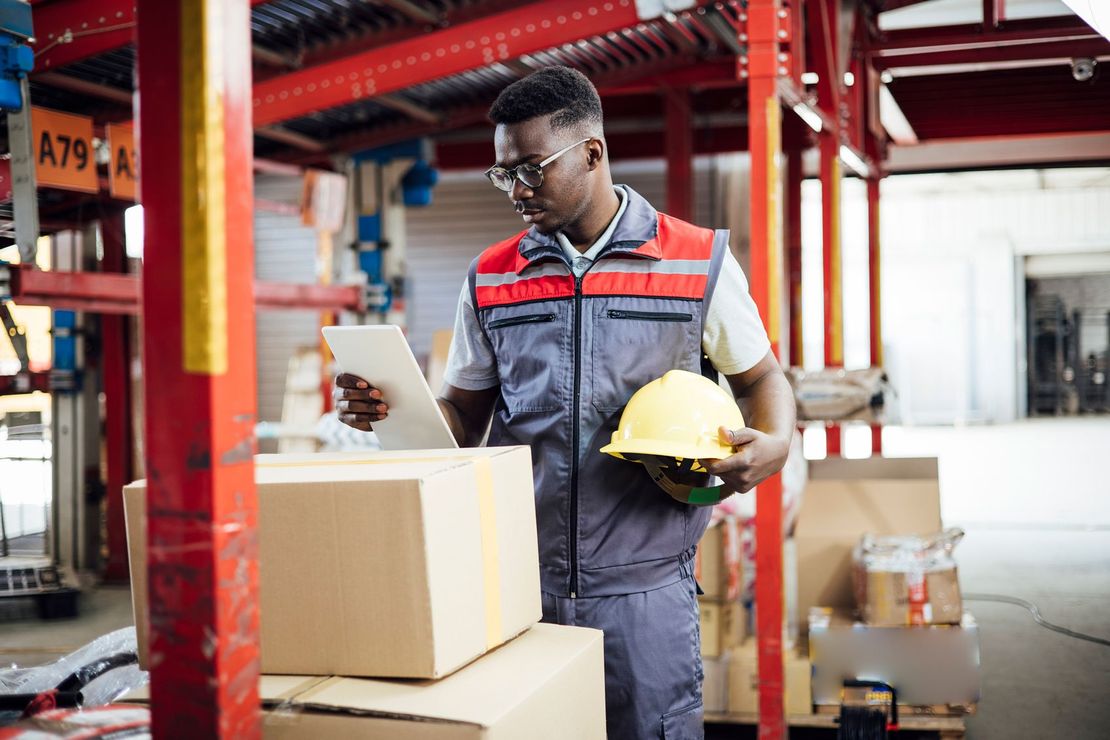 A man organizing packages — Monroe, LA — Ross Movers, Inc.