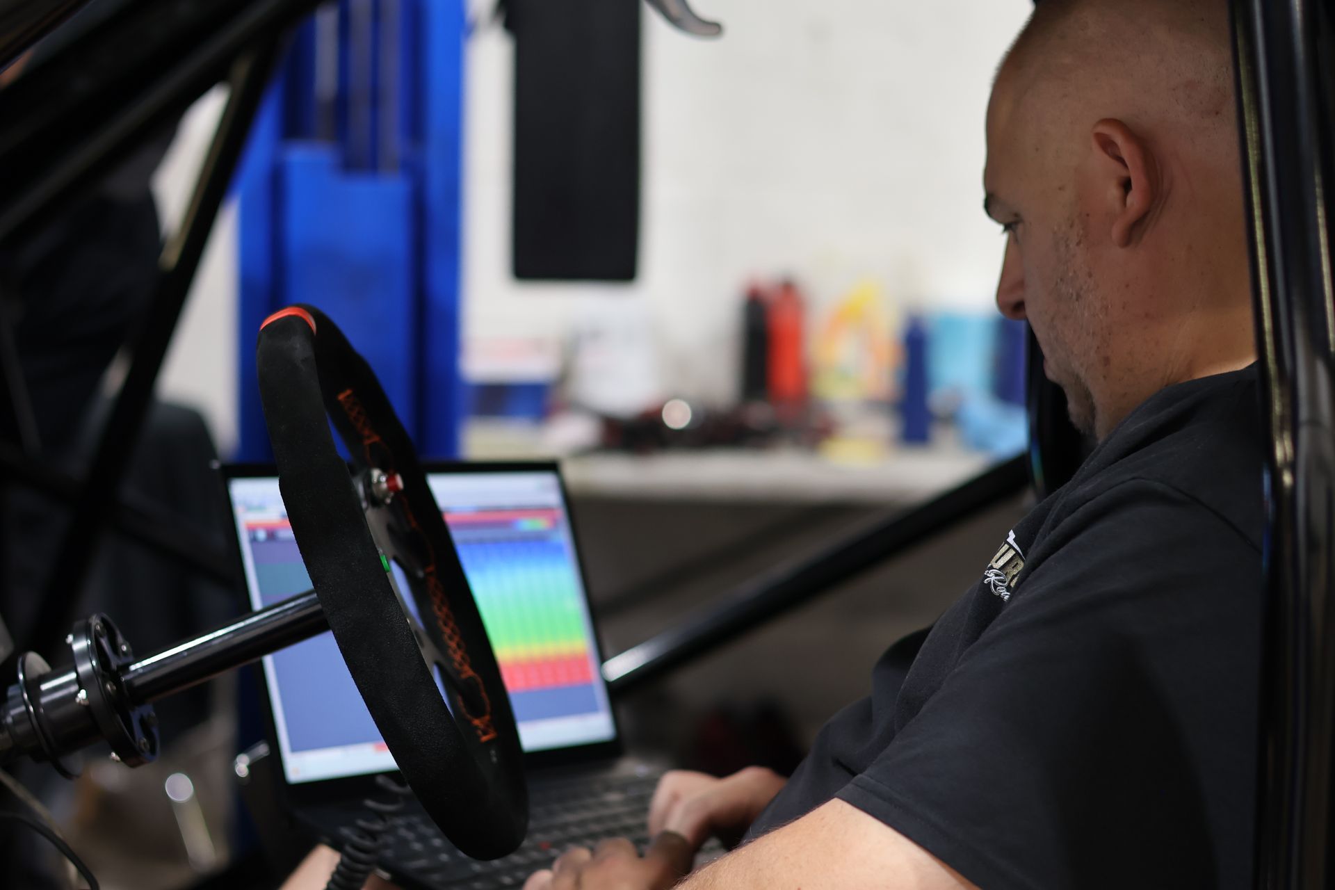 Chris Buhidar, Co-Owner & Head Tuner at Truck Source Diesel tuning his diesel race truck named Blackbird