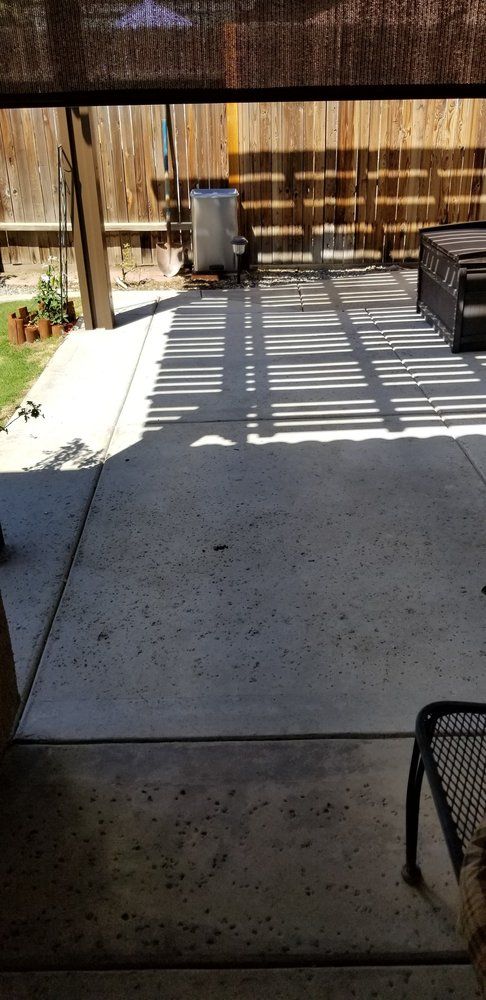 A view of a patio from inside a house.