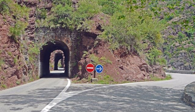 Scenic mountain road tunnel symbolizing life's journey at Funeral Homes York, PA