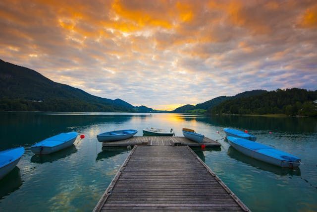Serene lakeside dock at sunset reflecting peace at Funeral Homes York, PA