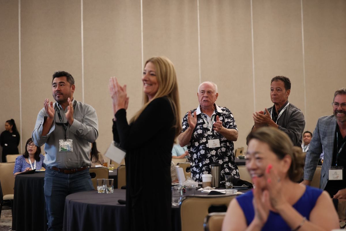Attendees on their feet during the Summer CAMP 2026 Awards Lunch